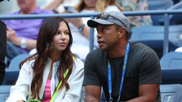 Tiger Woods and his girlfriend watching Serena Williams at the U.S. Open.