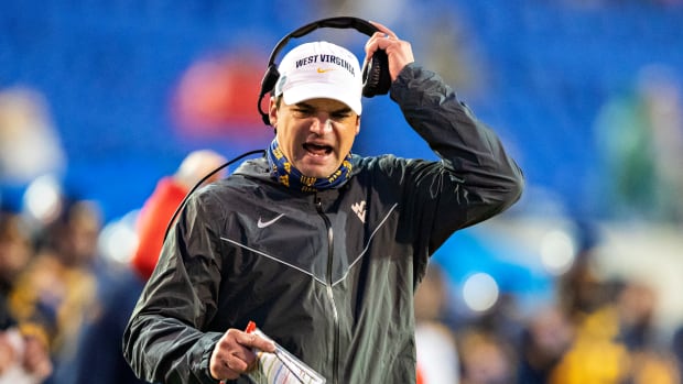 Neal Brown of the West Virginia Mountaineers on the sideline.