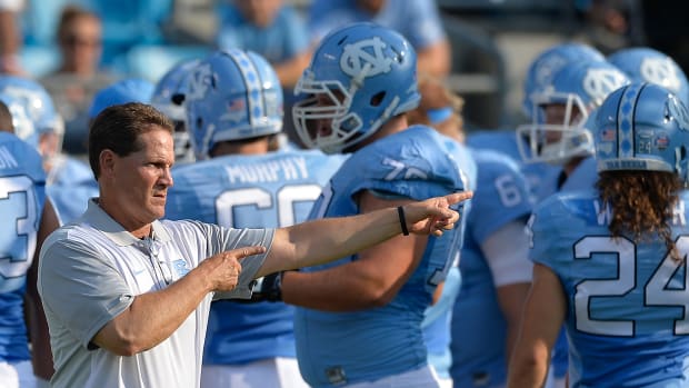 CHARLOTTE, NC - SEPTEMBER 03:  Defensive coordinator Gene Chizik of the North Carolina Tar Heels during their game against the South Carolina Gamecocks at Bank of America Stadium on September 3, 2015 in Charlotte, North Carolina. South Carolina won 17-13.  (Photo by Grant Halverson/Getty Images)