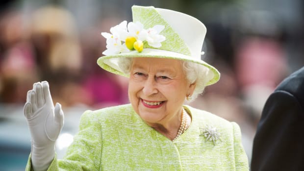 Queen Elizabeth II waves to a crowd in Windsor, England.