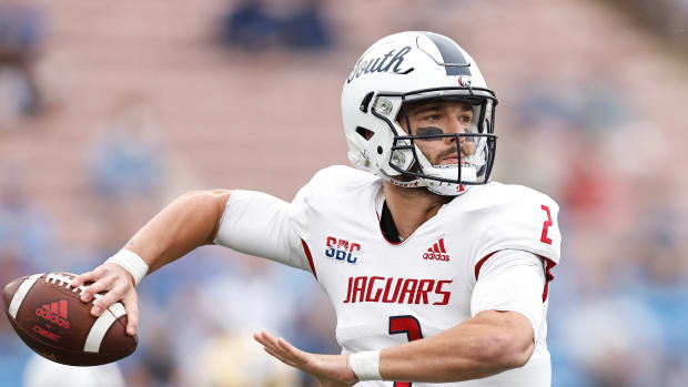 Carter Bradley of South Alabama passes against the UCLA Bruins during the first half.