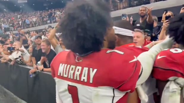 A slow motion video of Kyler Murray getting hit in the face by a fan.