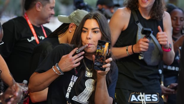 LAS VEGAS, NV - SEPTEMBER 20: Kelsey Plum #10 of the Las Vegas Aces celebrates during the 2022 WNBA Championship Parade on the strip in Las Vegas on September 20, 2022 in Las Vegas, Nevada. NOTE TO USER: User expressly acknowledges and agrees that, by downloading and or using this photograph, User is consenting to the terms and conditions of the Getty Images License Agreement. (Photo by Jeff Bottari/NBAE via Getty Images)