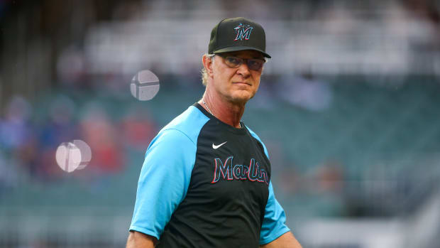 Manager Don Mattingly makes a pitching change for the Miami Marlins.