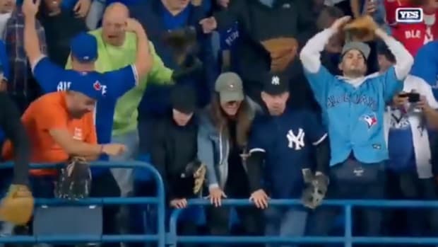 Fans just miss out on catching Aaron Judge's record-setting 61st home run.