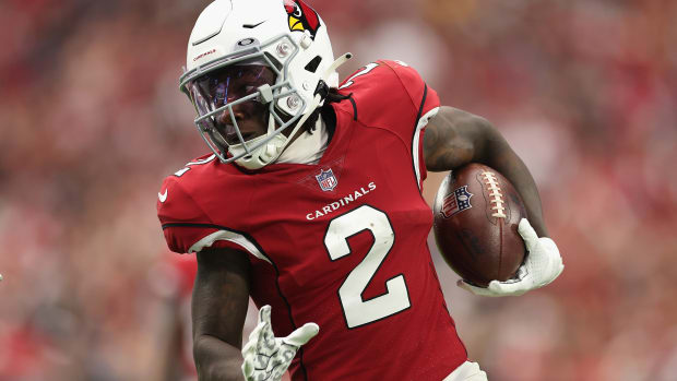 Marquise Brown running with the ball for the Cardinals.