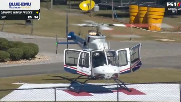 NASCAR driver gets airlifted off the track.