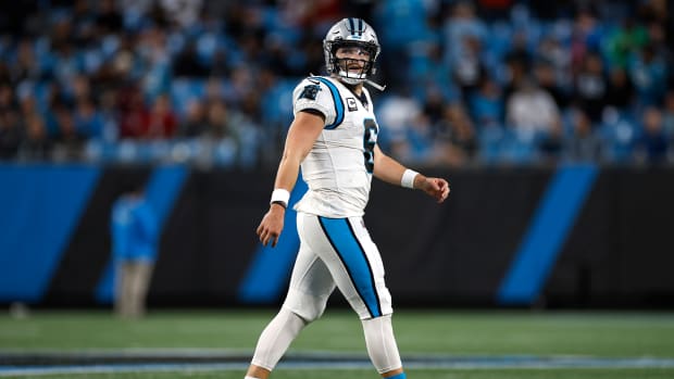 Panthers quarterback Baker Mayfield walks off the field on Sunday.