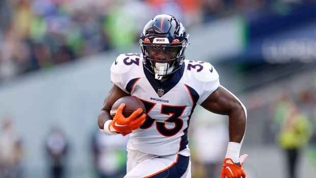 Broncos running back Javonte Williams carries the ball against the Seattle Seahawks.