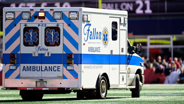 Saivion Smith gets taken off the field in an ambulance.