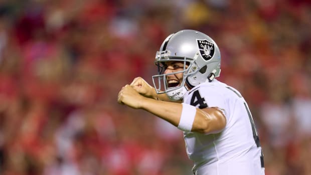 Derek Carr of the Raiders reacts.