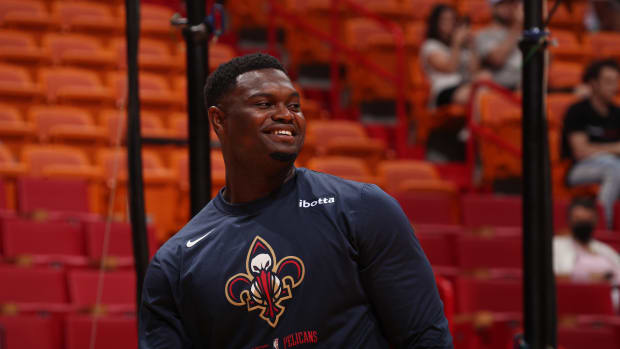 Pelicans big man Zion Williamson looks on the court during warmups.
