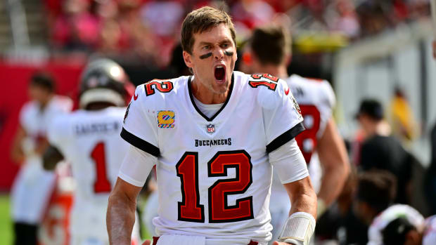 TAMPA, FLORIDA - OCTOBER 09: Tom Brady #12 of the Tampa Bay Buccaneers reacts on the sideline during the second half in the game against the Atlanta Falcons at Raymond James Stadium on October 09, 2022 in Tampa, Florida. (Photo by Julio Aguilar/Getty Images)