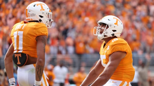 KNOXVILLE, TENNESSEE - OCTOBER 15: Wide receiver Jalin Hyatt #11 and wide receiver Bru McCoy #15 of the Tennessee Volunteers celebrate after a touchdown in the first quarter against the Alabama Crimson Tide at Neyland Stadium on October 15, 2022 in Knoxville, Tennessee. (Photo by Donald Page/Getty Images)