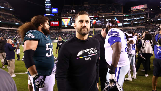 Eagles head coach Nick Sirianni walks off the field after beating the Cowboys.