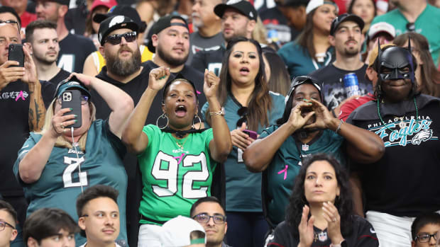 GLENDALE, ARIZONA - OCTOBER 09: Fans cheer during the second half of the NFL game between the Arizona Cardinals and the Philadelphia Eagles at State Farm Stadium on October 09, 2022 in Glendale, Arizona. The Eagles defeated the Cardinals 20-17.  (Photo by Christian Petersen/Getty Images)