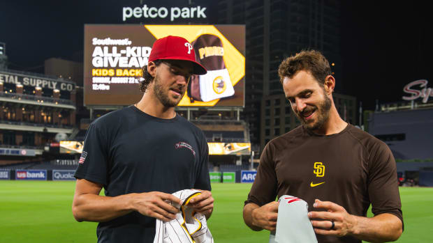 Aaron and Austin Nola exchange jerseys after a Phillies-Padres game.