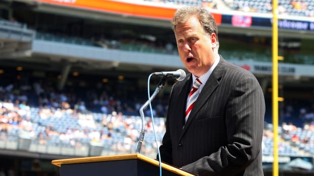 Michael Kay speaks during Old Timers Day at Yankee Stadium.