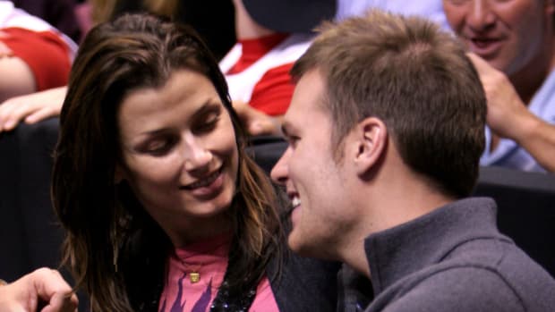 Tom Brady and his ex-girlfriend, Bridget Moynahan, on the floor of an NBA game.