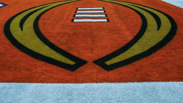 The College Football Playoff logo on the field before the semifinal between Clemson and Ohio State.