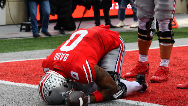 COLUMBUS, OHIO - NOVEMBER 12: Kamryn Babb #0 of the Ohio State Buckeyes reacts after scoring a touchdown during the fourth quarter of a game against the Indiana Hoosiers at Ohio Stadium on November 12, 2022 in Columbus, Ohio. (Photo by Ben Jackson/Getty Images)