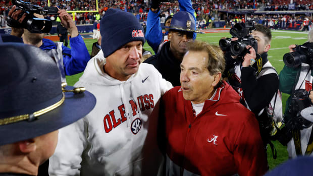 OXFORD, MS - NOVEMBER 12: Alabama Crimson Tide head coach Nick Saban meets with Mississippi Rebels head coach Lane Kiffin following a college football game on November 12, 2022 at Vaught-Hemingway Stadium in Oxford, Mississippi. (Photo by Joe Robbins/Icon Sportswire via Getty Images)