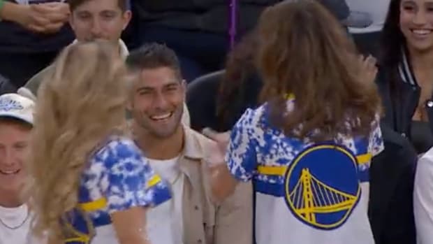 Jimmy G with the Warriors dancers.