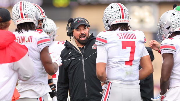 EVANSTON, ILLINOIS - NOVEMBER 05: Head coach Ryan Day of the Ohio State Buckeyes talks with C.J. Stroud #7 against the Northwestern Wildcats during the second half at Ryan Field on November 05, 2022 in Evanston, Illinois. (Photo by Michael Reaves/Getty Images)