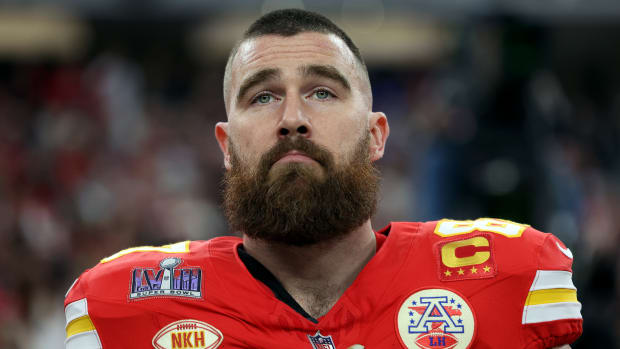 LAS VEGAS, NEVADA - FEBRUARY 11: Travis Kelce #87 of the Kansas City Chiefs stands for the national anthem prior to Super Bowl LVIII against the San Francisco 49ers at Allegiant Stadium on February 11, 2024 in Las Vegas, Nevada. (Photo by Jamie Squire/Getty Images)
