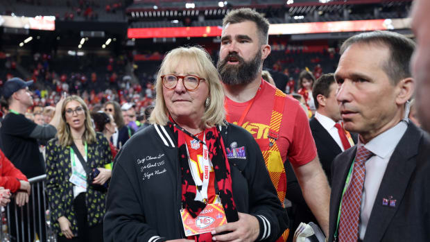 LAS VEGAS, NV - FEBRUARY 11: Donna and Jason Kelce stand on the field after Super Bowl LVIII between the Kansas City Chiefs and the San Francisco 49ers at Allegiant Stadium on February 11, 2024 in Las Vegas, NV. (Photo by Perry Knotts/Getty Images)