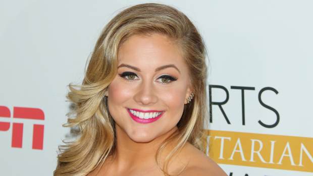 Shawn Johnson on the red carpet at an event.