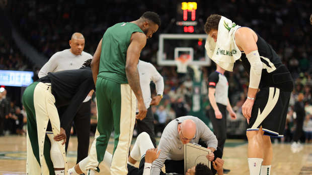 MILWAUKEE, WISCONSIN - APRIL 09: Giannis Antetokounmpo #34 of the Milwaukee Bucks is injured during the second half of a game against the Boston Celtics at Fiserv Forum on April 09, 2024 in Milwaukee, Wisconsin. NOTE TO USER: User expressly acknowledges and agrees that, by downloading and or using this photograph, User is consenting to the terms and conditions of the Getty Images License Agreement. (Photo by Stacy Revere/Getty Images)