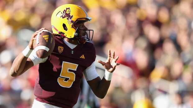 TEMPE, ARIZONA - NOVEMBER 25: Quarterback Jaden Rashada #5 of the Arizona State Sun Devils looks to pass during the first half of the NCAAF game at Mountain America Stadium on November 25, 2023 in Tempe, Arizona. (Photo by Christian Petersen/Getty Images)
