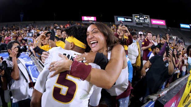 PASADENA, CALIFORNIA - OCTOBER 02: Regina Jackson, mom of Jayden Daniels #5 of the Arizona State Sun Devils, celebrates a 42-23 Sun Devils win over the UCLA Bruins at Rose Bowl on October 02, 2021 in Pasadena, California. (Photo by Harry How/Getty Images)