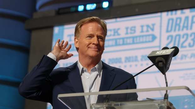 KANSAS CITY, MO - APRIL 28: Commissioner Roger Goodell holds his hand to his ear as if to tell the crowd he can't hear the boos during day two of the NFL Draft on April 28, 2023 at Union Station in Kansas City, MO. (Photo by Scott Winters/Icon Sportswire via Getty Images)