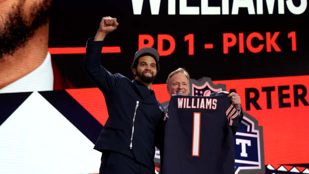 Caleb Williams on stage with Roger Goodell after being picked No. 1 overall in the 2024 NFL Draft.