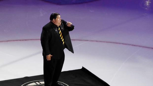 TD Garden bartender Todd Angilly sings the national anthem
