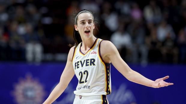 UNCASVILLE, CONNECTICUT - MAY 14: Caitlin Clark #22 of the Indiana Fever reacts after a foul during the first quarter against the Connecticut Sun in the game at Mohegan Sun Arena on May 14, 2024 in Uncasville, Connecticut. NOTE TO USER: User expressly acknowledges and agrees that, by downloading and or using this photograph, User is consenting to the terms and conditions of the Getty Images License Agreement. (Photo by Elsa/Getty Images)