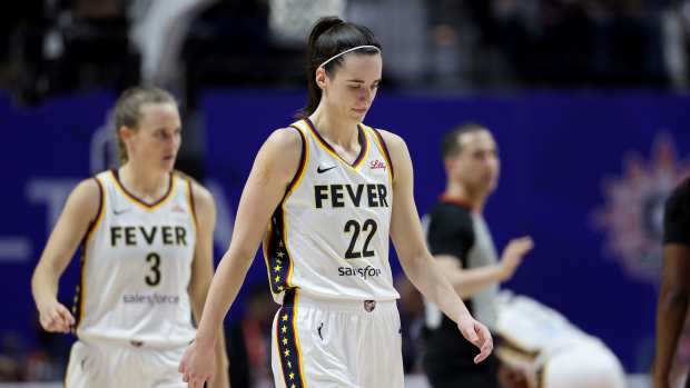 UNCASVILLE, CONNECTICUT - MAY 14: Caitlin Clark #22 of the Indiana Fever reacts during the second quarter against the Connecticut Sun in the game at Mohegan Sun Arena on May 14, 2024 in Uncasville, Connecticut. NOTE TO USER: User expressly acknowledges and agrees that, by downloading and or using this photograph, User is consenting to the terms and conditions of the Getty Images License Agreement. (Photo by Elsa/Getty Images)