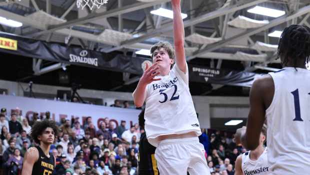 Daniel Jacobsen shoots the ball during a high school game.