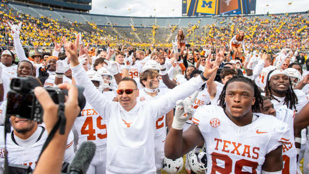 ANN ARBOR, MICHIGAN - SEPTEMBER 07: Head Football Coach Steve Sarkisian of the Texas Longhorns leads his team in the singing of their school's song after winning a college football game against the Michigan Wolverines at Michigan Stadium on September 07, 2024 in Ann Arbor, Michigan. The Texas Longhorns won the game 31-12. (Photo by Aaron J. Thornton/Getty Images)