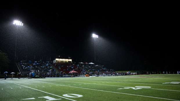 A high school football field.