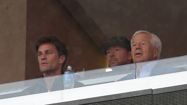 Patriots legends Tom Brady in the booth with Robert Kraft.