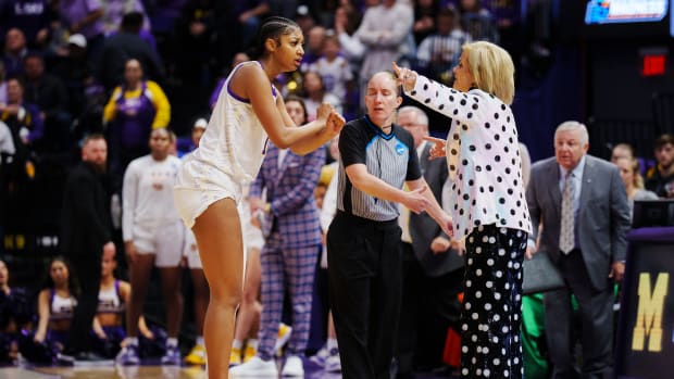 BATON ROUGE, LA - MARCH 19: Head coach Kim Mulkey talks to Angel Reese #10 of the LSU Lady Tigers during the fourth quarter against the Michigan Wolverines in the second round of the 2023 NCAA Women's Basketball Tournament held at the Pete Maravich Assembly Center on March 19, 2023 in Baton Rouge, Louisiana. (Photo by Rebecca Warren/NCAA Photos via Getty Images)
