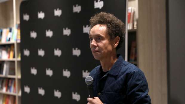 Malcolm Gladwell on the mic.