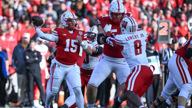 LINCOLN, NEBRASKA - NOVEMBER 23: Dylan Raiola #15 of the Nebraska Cornhuskers passes against the Wisconsin Badgers during the second quarter at Memorial Stadium on November 23, 2024 in Lincoln, Nebraska.  (Photo by Steven Branscombe/Getty Images)