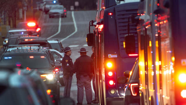 Authorities outside of the Abundant Life Christian School following a shooting.