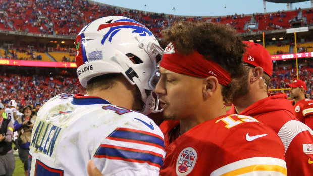 Patrick Mahomes hugging Josh Allen.