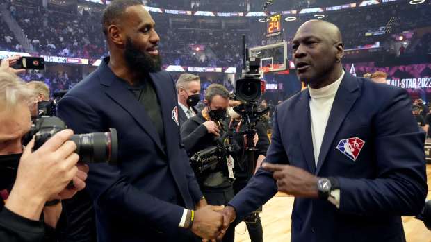 CLEVELAND, OHIO - FEBRUARY 20: (L-R) LeBron James and Michael Jordan attend the 2022 NBA All-Star Game at Rocket Mortgage Fieldhouse on February 20, 2022 in Cleveland, Ohio. (Photo by Kevin Mazur/Getty Images)