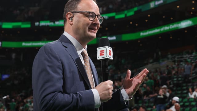 Adrian Wojnarowski provides analysis during an NBA game for ESPN